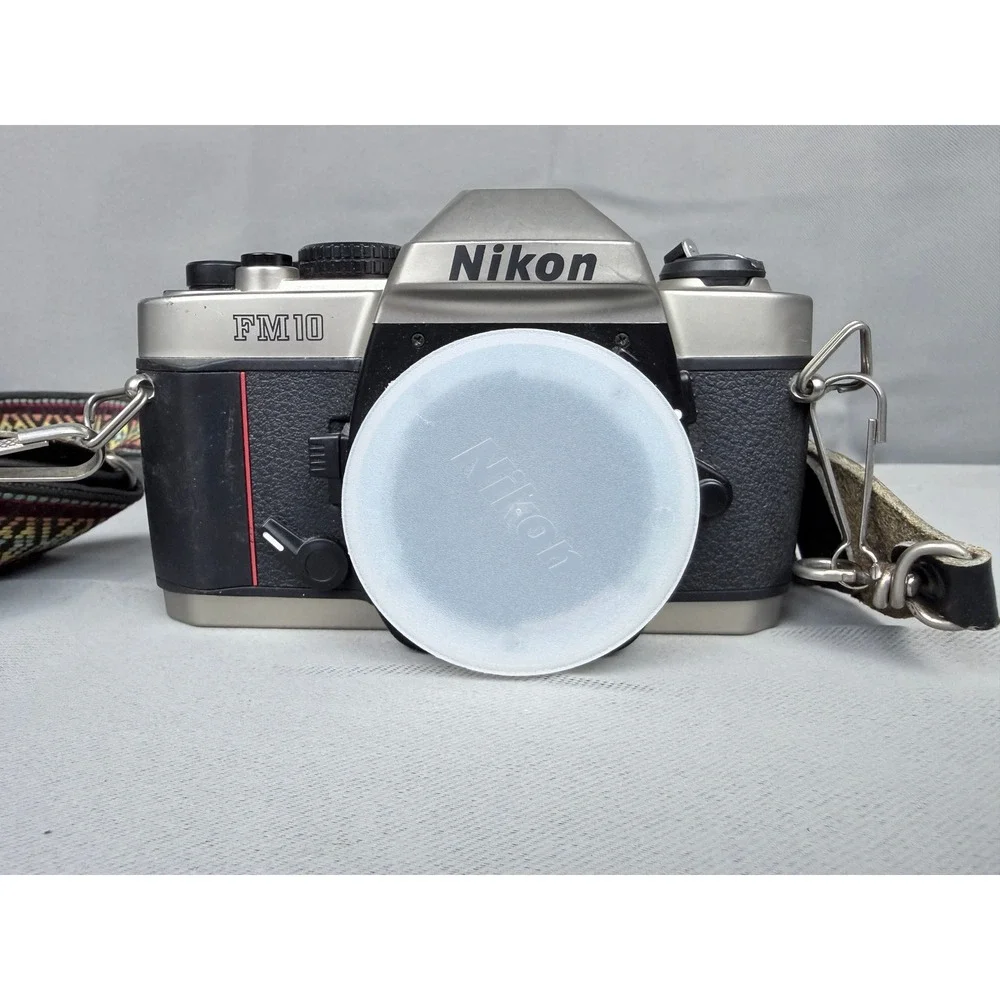 Nikon FM10 35mm Film SLR Camera Body Champagne Gold Made in Japan with Strap